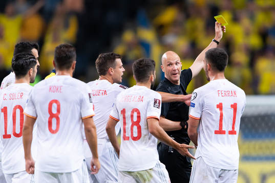 Dejan Kulusevski of Sweden (not pictured) is shown a yellow