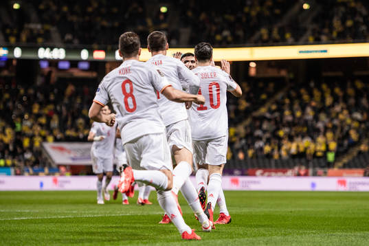 Gerard Moreno and Carlos Soler of Spain celebrate the 0-1