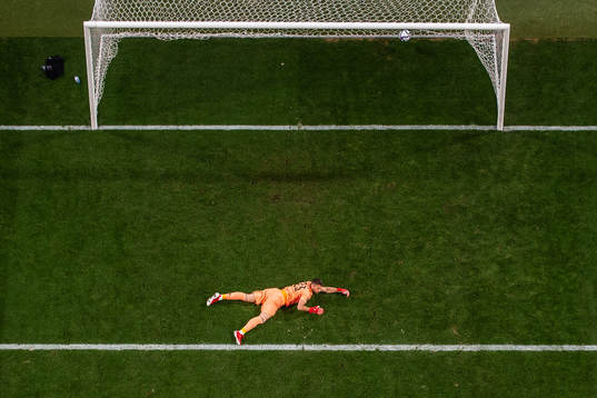 Goalkeeper Unai Simon of Spain looks dejected