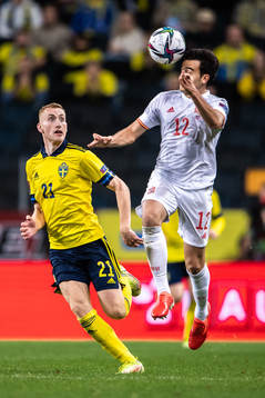 Dejan Kulusevski of Sweden and Eric Garcia of Spain