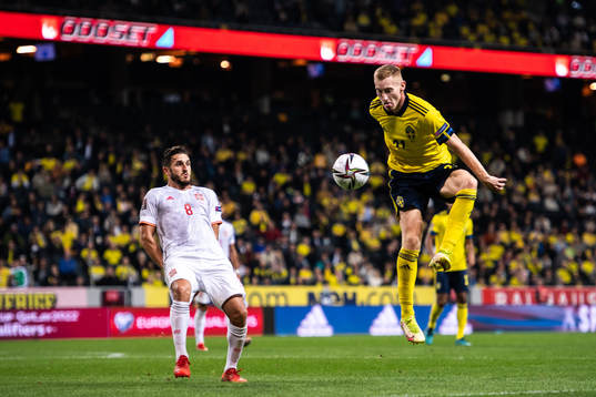 Koke of Spain and Dejan Kulusevski of Sweden