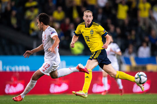 Eric Garcia of Spain and Dejan Kulusevski of Sweden