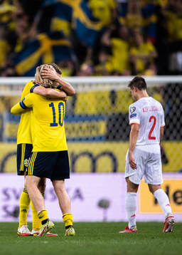Viktor Claesson and Emil Forsberg of Sweden celebrate