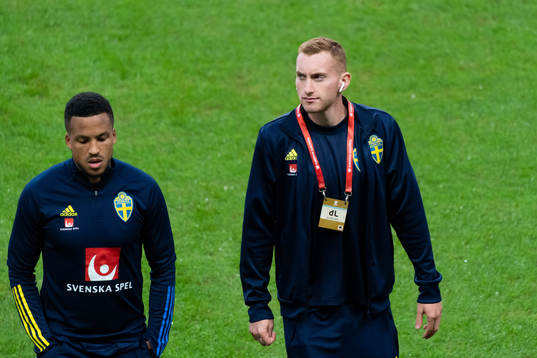 Martin Olsson and Dejan Kulusevski of Sweden