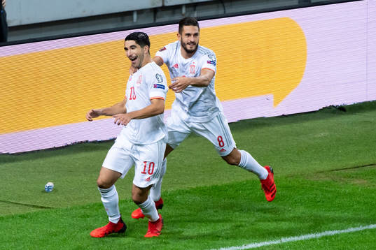 of Spain Carlos Soler and Koke celebrate the 0-1 goal