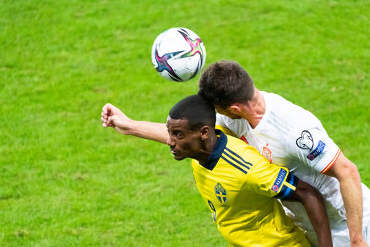 Alexander Isak of Sweden and Aymeric Laporte of Spain