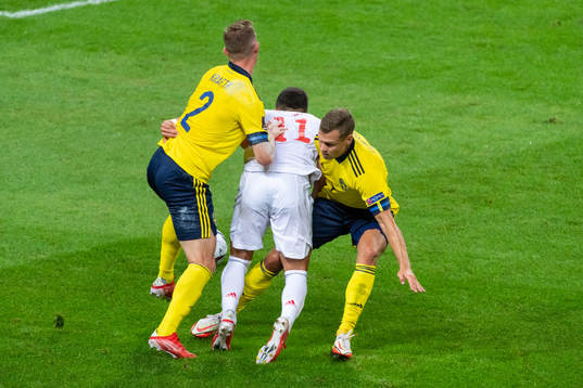 Emil Krafth and Viktor Claesson of Sweden against Ferran
