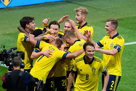 The Swedish players celebrate