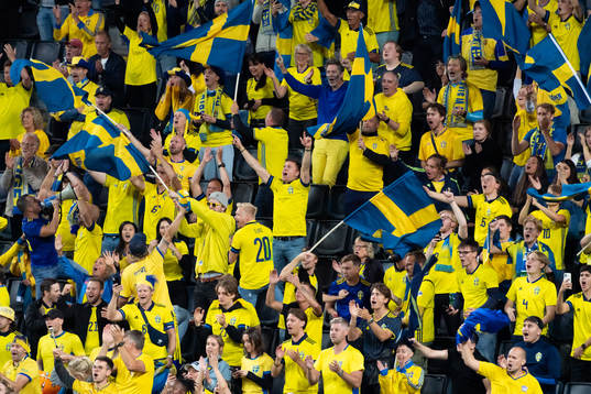 The Swedish supporters celebrate