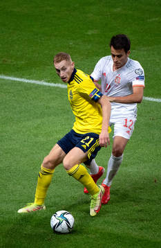 Dejan Kulusevski of Sweden and Eric Garcia