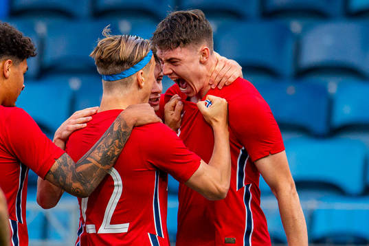 Jørgen Strand Larsen of Norway celebrates with teammate