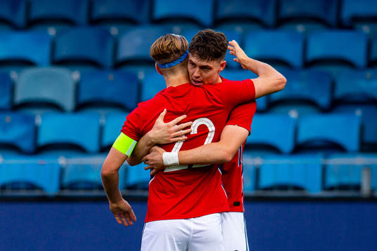 Jørgen Strand Larsen of Norway celebrates with teammate