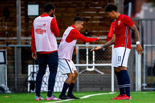 Noah Holm of Norway celebrates with teammates Emil