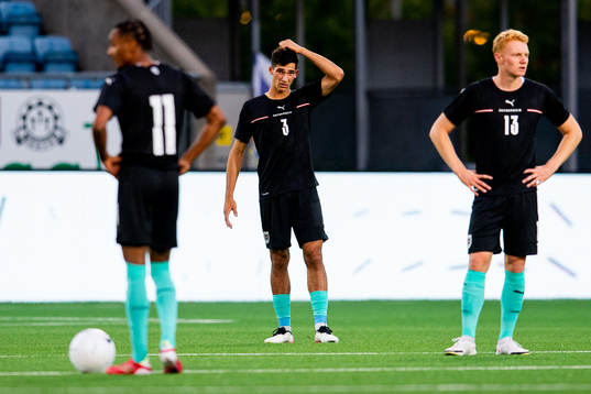 Leo Greiml and Nicolas Seiwald of Austria look dejected