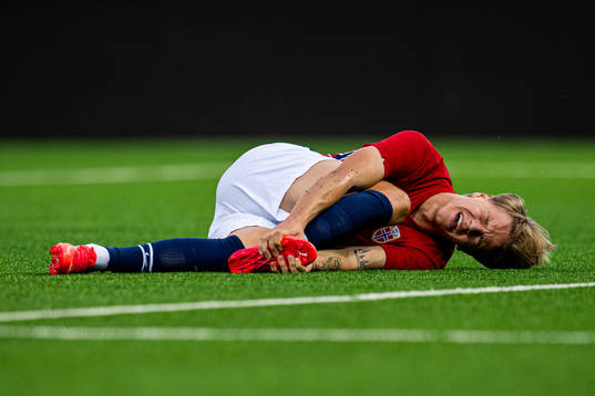 Jesper Daland of Norway with an injury