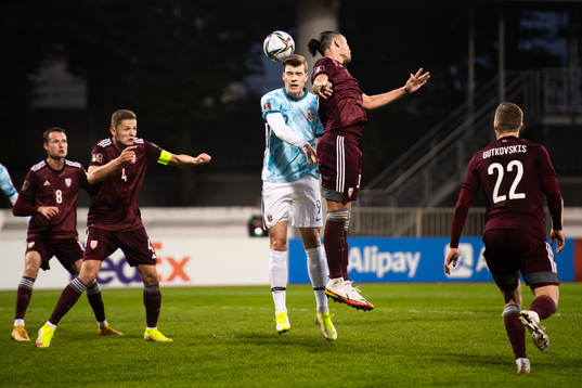 Alexander Sørloth of Norway and Igor Tarasovs of Latvia