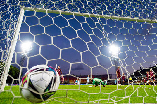 Mohamed Elyounoussi of Norway scores the 0-2 goal behind