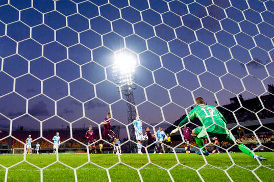 Mohamed Elyounoussi of Norway scores the 0-2 goal behind
