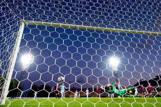 Mohamed Elyounoussi of Norway scores the 0-2 goal behind