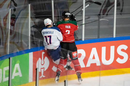 Christian Folin of Frölunda  hits John Quenneville of