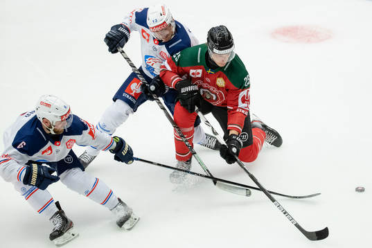 Yannick Weber and Justin Sigrist against Elmer Söderblom