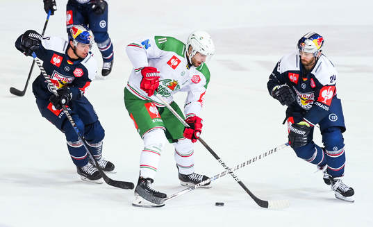 Mattias Sjögren of Rögle against Frederik Tiffels and