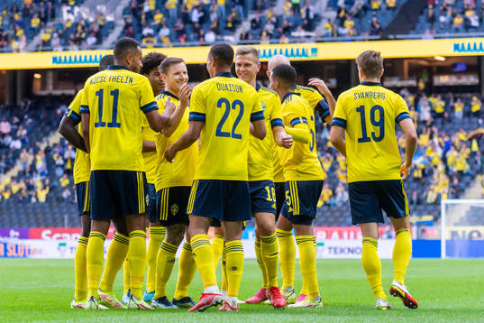 The Swedish players celebrate
