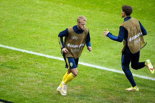 Daniel Sundgren of Sweden are warming up