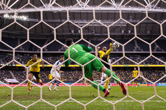Isaac Kiese-Thelin of Sweden scores the 2-0 goal