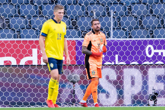 Goalkeeper Kristoffer Nordfeldt of Sweden looks dejected