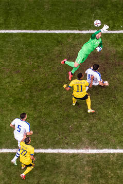 Goalkeeper Eldorbek Suyunov of Uzbekistan with a save in