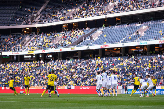 Martin Olsson of Sweden with a free kick