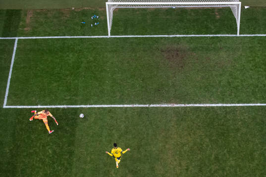 Goalkeeper Kristoffer Nordfeldt of Sweden lets in the 2-1