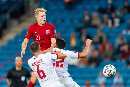 Andreas Hanche-Olsen of Norway competes for the ball with