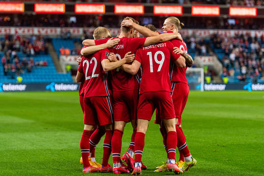 Alexander Sørloth of Norway celebrates with team mates