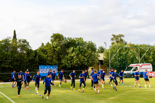 Players of the Greek national football team warm  up