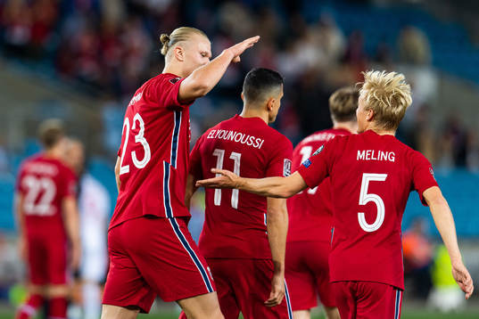 Erling Braut Haaland and Birger Meling of Norway celebrate