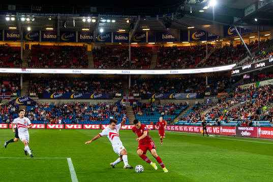 Ethan Jolley of Gibraltar and Mohamed Elyounoussi of Norway