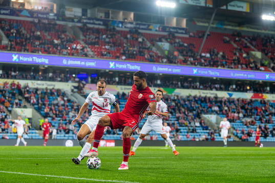 Roy Chipolina of Gibraltar and Joshua King of Norway