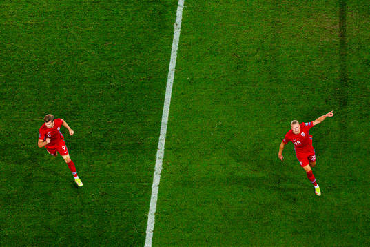 Erling Braut Haaland of Norway celebrates with teammate