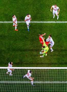 Kristian Thorstvedt of Norway is knocked down by goalkeeper