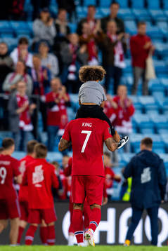 Joshua King of Norway with his son