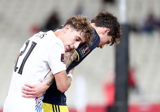 Kostas Tsimikas of Greece and Victor Nilsson Lindelöf of