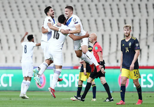 Vangelis Pavlidis of Greece celebrate with teammates