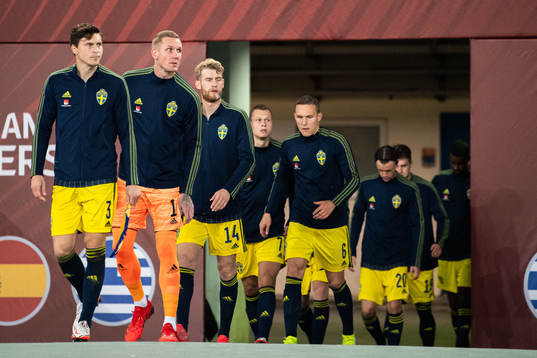 Victor Nilsson Lindelöf and goalkeeper Robin Olsen of