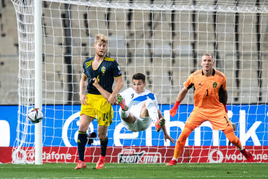 Filip Helander and goalkeeper Robin Olsen of Sweden against