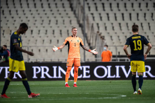Goalkeeper Robin Olsen of Sweden looks dejected