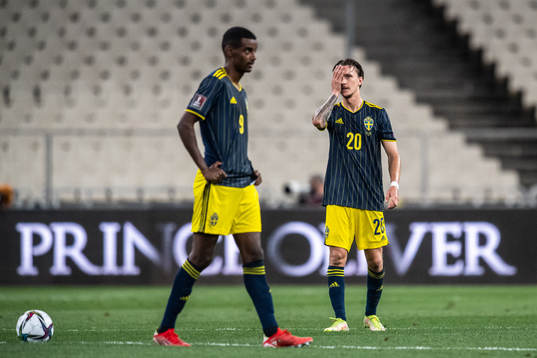 Alexander Isak and Kristoffer Olsson of Sweden look dejected