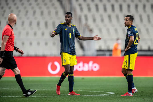 Alexander Isak and Robin Quaison of Sweden look dejected