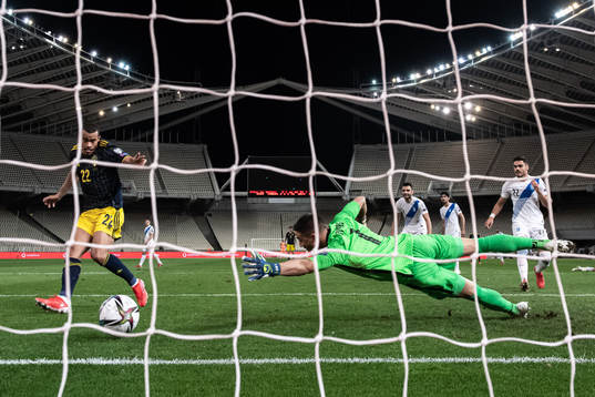 Robin Quaison of Sweden scores the 2-1 goal behind